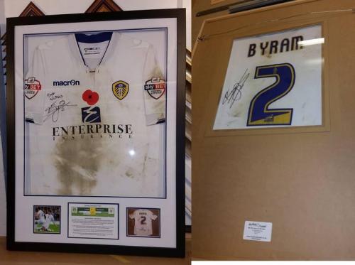 Leeds United Player Sam Byram match worn and signed shirt framed with a hole in the back for players number